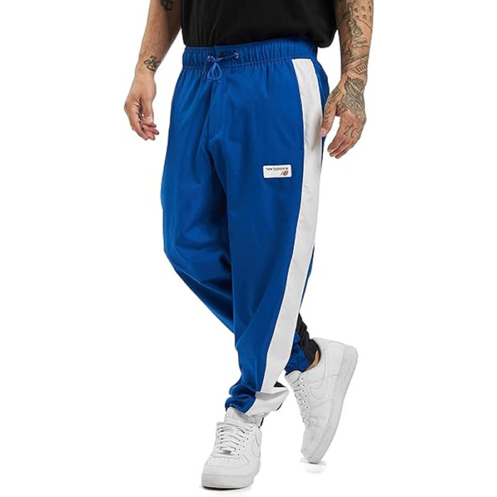 Pantalon de survêtement New Balance NB ATHLETICS WINDBREAKE